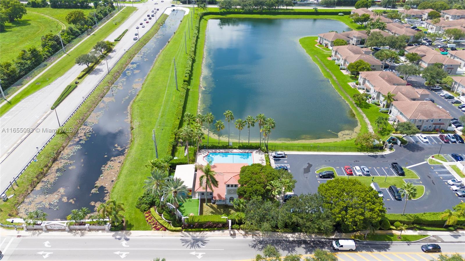 5301 Southwest 126th Terrace, Unit 5301 Miramar, FL 33027 - Photo 36 of 37 an aerial view of a swimming pool with outdoor space