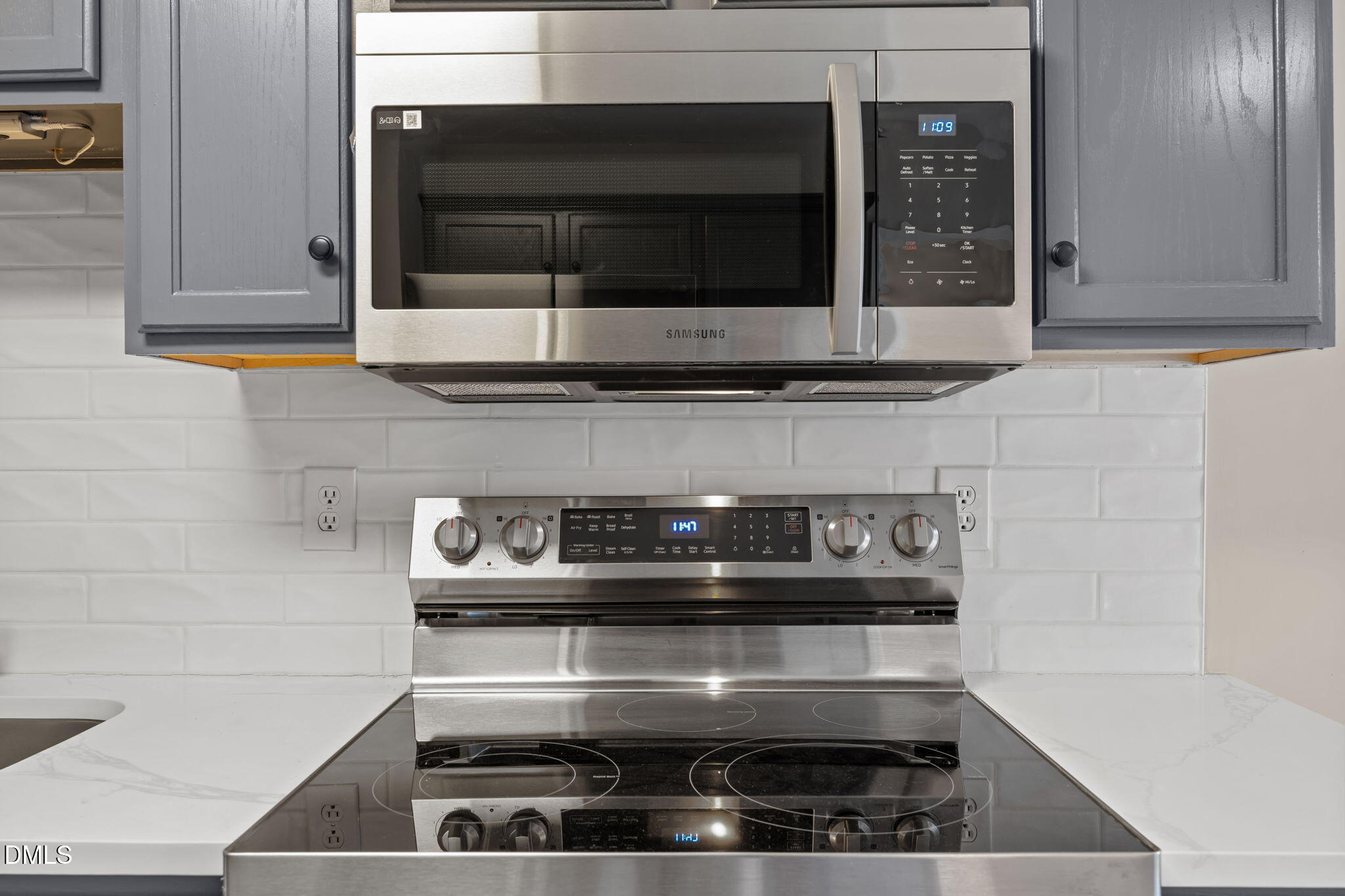 2813 Bedfordshire Court Raleigh, NC 27604 - Photo 15 of 46 a stove top oven sitting inside of a kitchen
