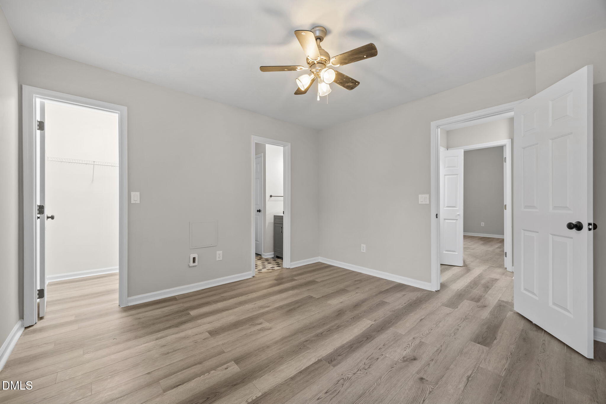 2813 Bedfordshire Court Raleigh, NC 27604 - Photo 24 of 46 a view of an empty room with wooden floor