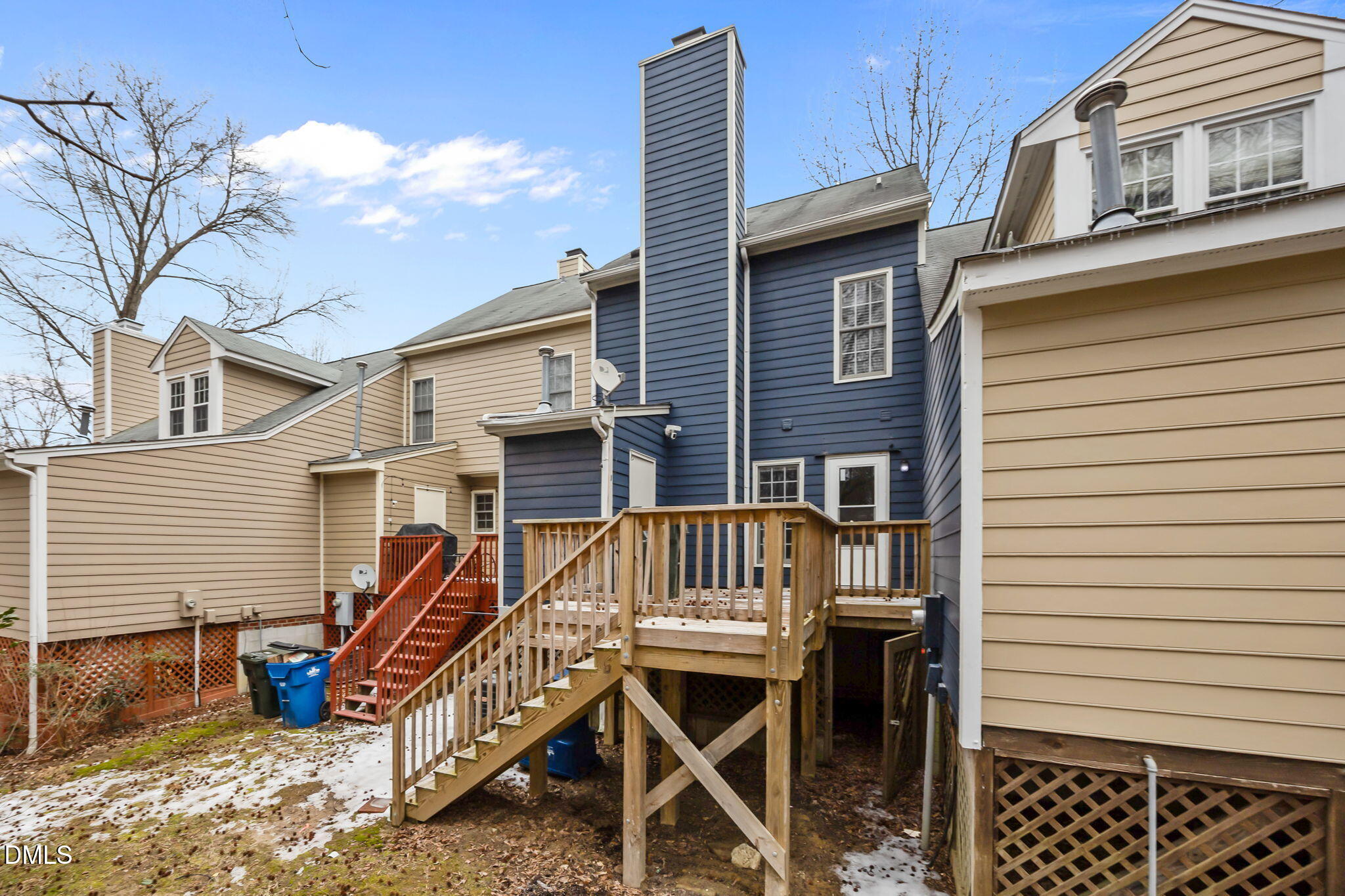 2813 Bedfordshire Court Raleigh, NC 27604 - Photo 37 of 46 a view of a house with a wooden deck