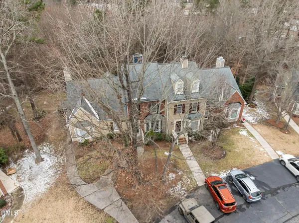 an aerial view of residential building and parking space