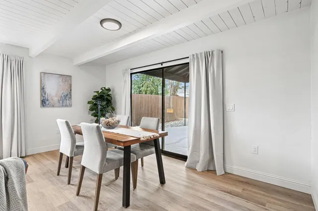 a view of a dining room with furniture