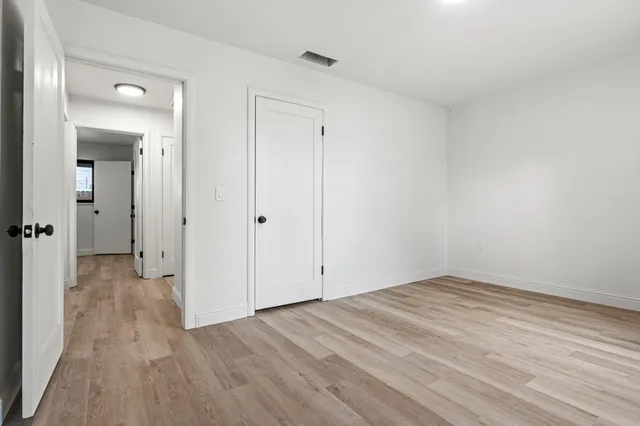 a bathroom with a sink a toilet and vanity