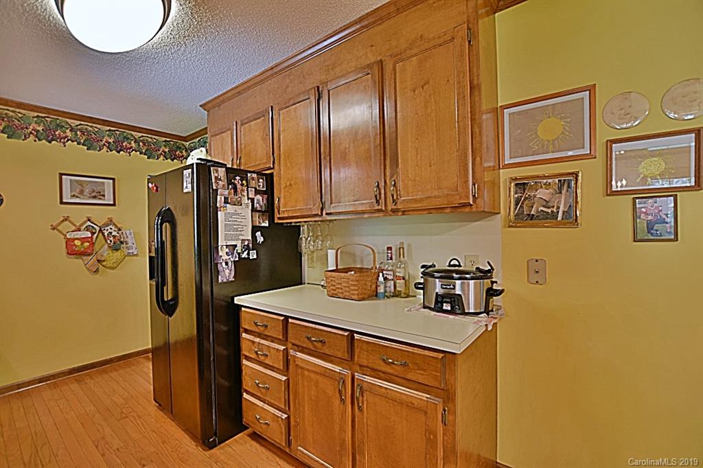 3550 Dobys Bridge Road Fort Mill, SC 29715 - Photo 12 of 48 a kitchen with stainless steel appliances granite countertop a refrigerator and a sink