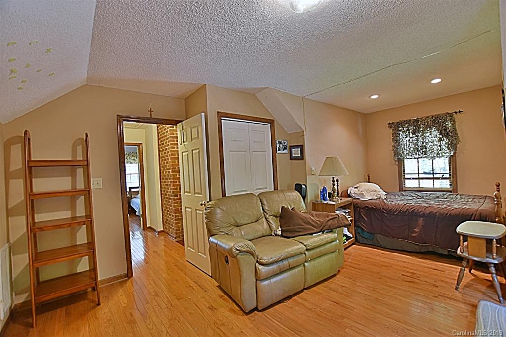 3550 Dobys Bridge Road Fort Mill, SC 29715 - Photo 17 of 48 a living room with furniture and a window