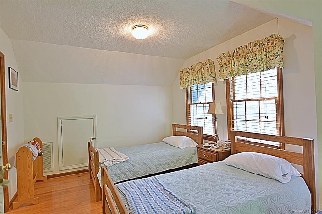 3550 Dobys Bridge Road Fort Mill, SC 29715 - Photo 19 of 48 a bedroom with two beds and a window