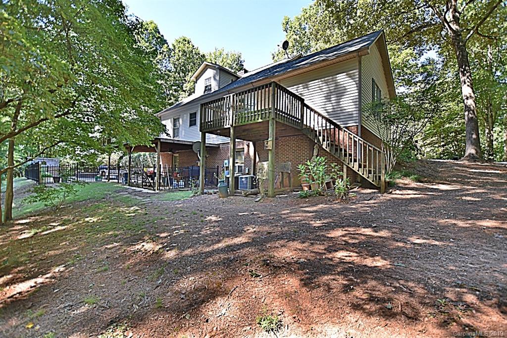 3550 Dobys Bridge Road Fort Mill, SC 29715 - Photo 30 of 48 a view of a house with a yard