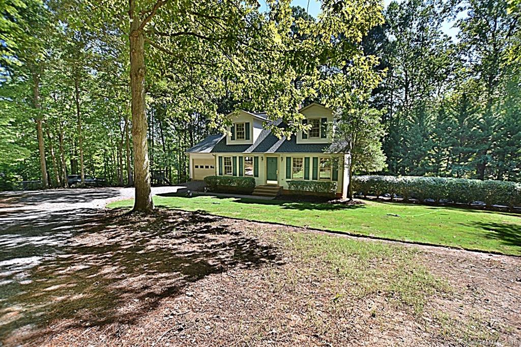 3550 Dobys Bridge Road Fort Mill, SC 29715 - Photo 33 of 48 a front view of a house with a yard