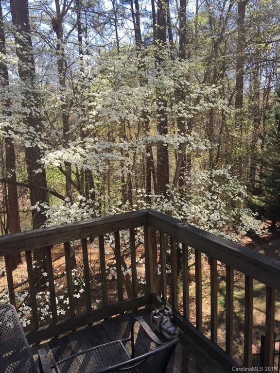 3550 Dobys Bridge Road Fort Mill, SC 29715 - Photo 45 of 48 a view of a balcony with wooden chairs