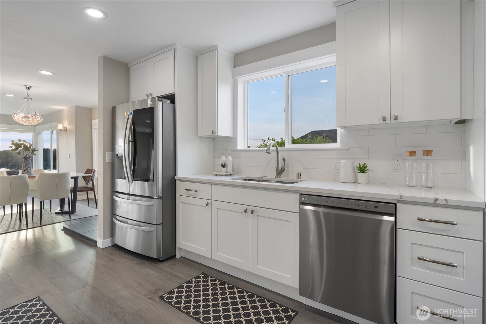 420 Renton Avenue South Renton, WA 98057 - Photo 15 of 40 a kitchen with stainless steel appliances a refrigerator sink and cabinets