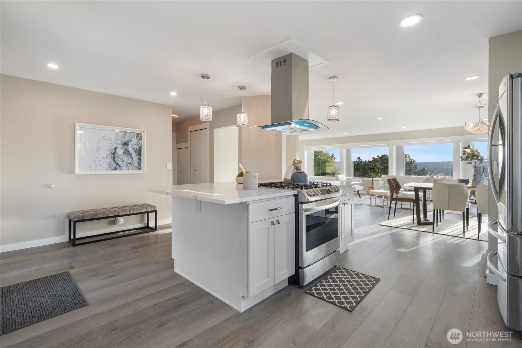 420 Renton Avenue South Renton, WA 98057 - Photo 18 of 40 a kitchen with stainless steel appliances granite countertop a stove and a refrigerator
