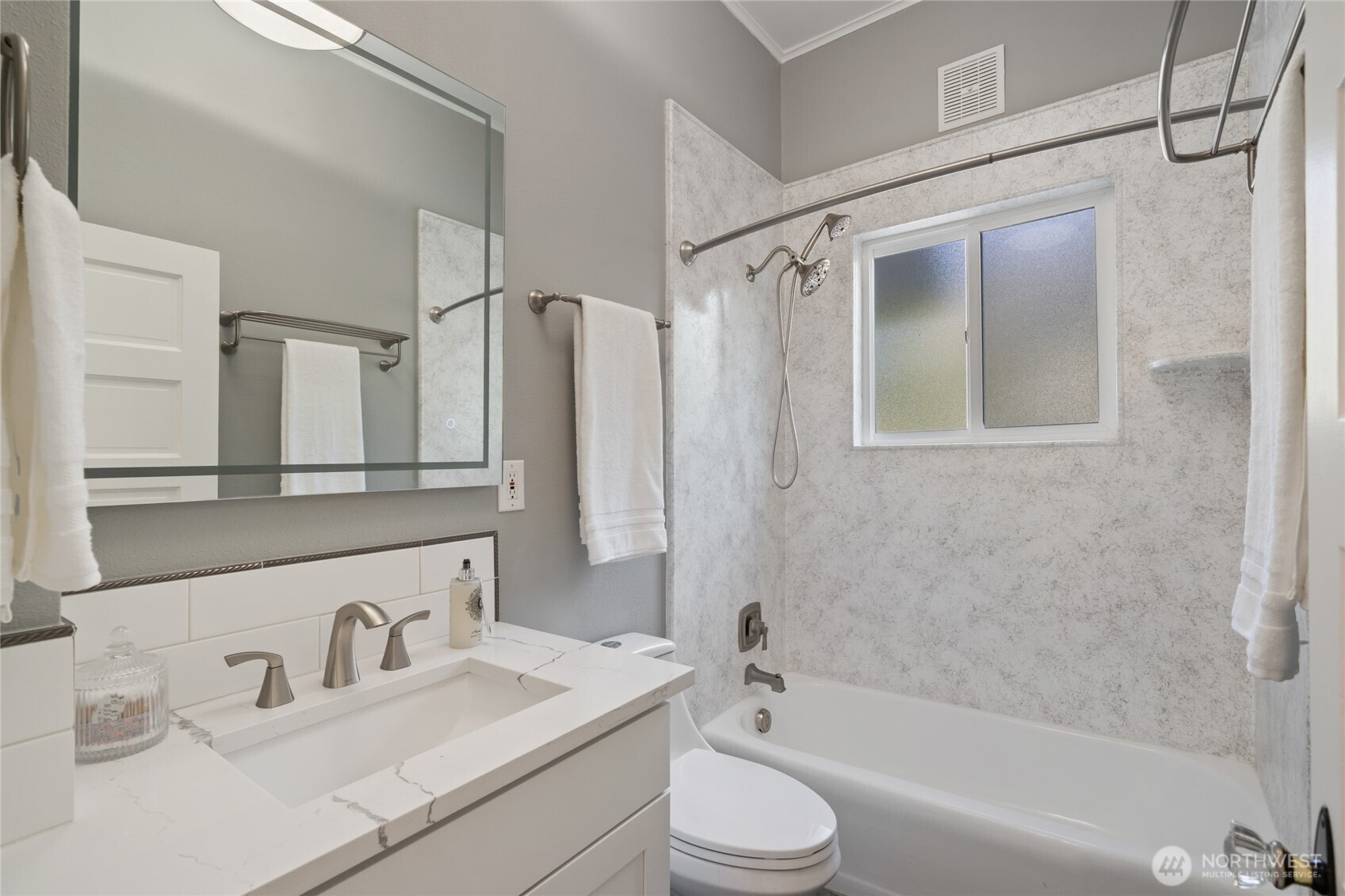 420 Renton Avenue South Renton, WA 98057 - Photo 20 of 40 a bathroom with a granite countertop sink toilet and shower