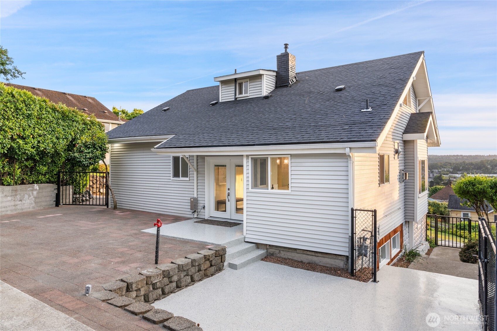 420 Renton Avenue South Renton, WA 98057 - Photo 30 of 40 a front view of a house with a yard