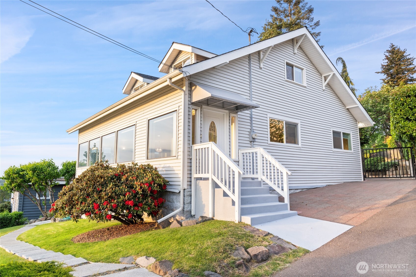420 Renton Avenue South Renton, WA 98057 - Photo 5 of 40 a view of a house with a patio