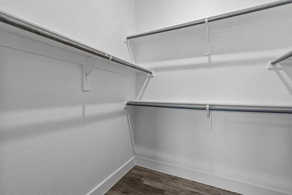 a view of a room with racks on the wall