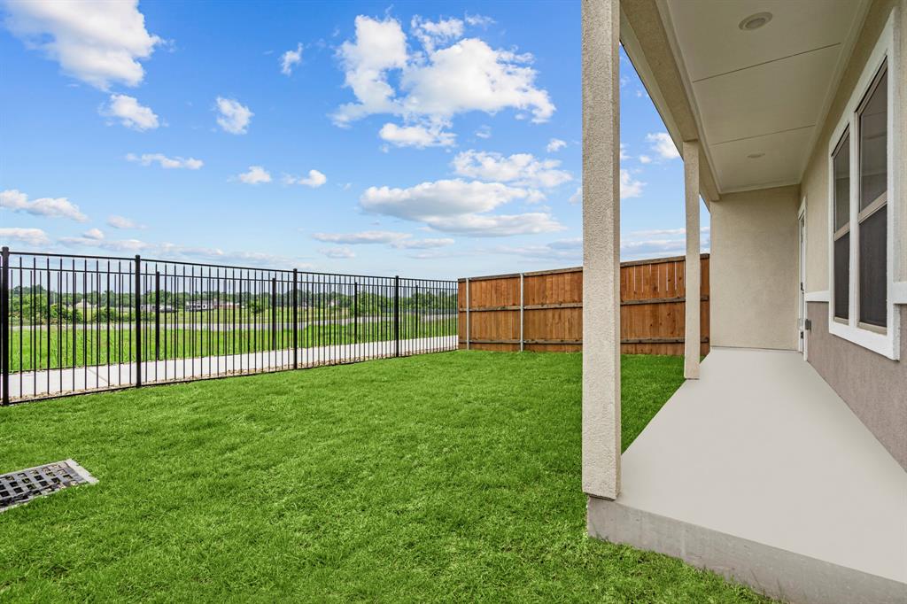 3281 Ganzer Road West, Unit 823A Denton, TX 76207 - Photo 20 of 40 a view of a backyard with staircase