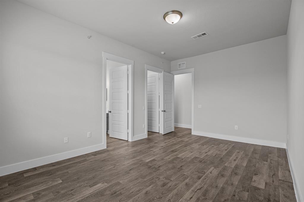 3281 Ganzer Road West, Unit 823A Denton, TX 76207 - Photo 31 of 40 a view of an empty room