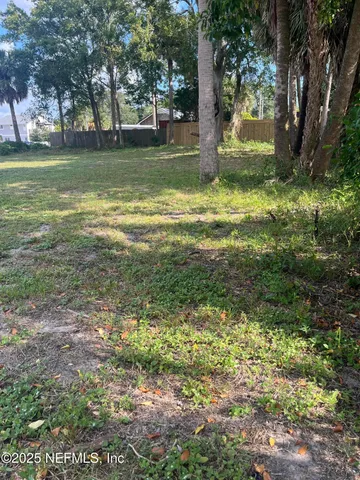 a view of outdoor space with deck and green space