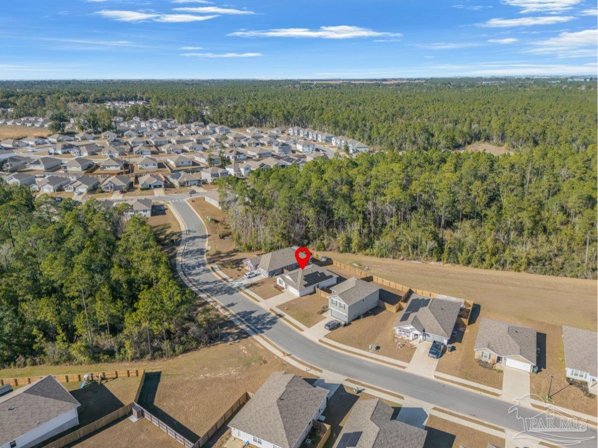 5872 Belmont Stakes Road Pensacola, FL 32526 - Photo 28 of 31 an aerial view of residential houses with outdoor space