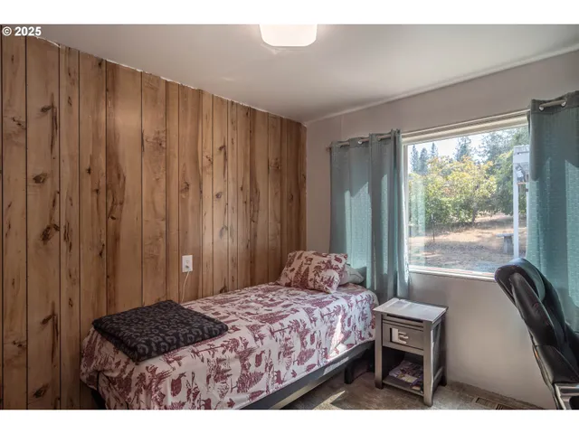 a view of a livingroom with furniture and windows