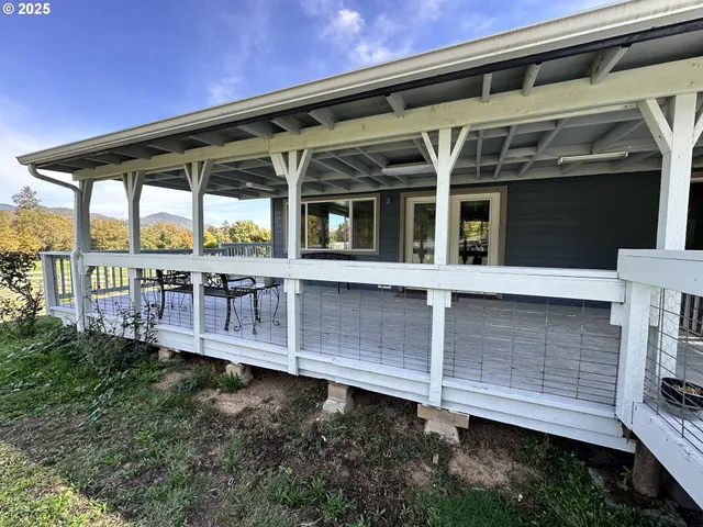 a view of a deck with wooden floor