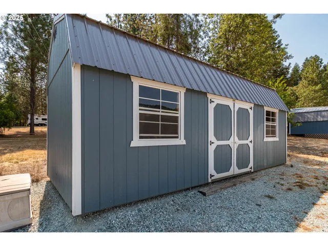 a garage filled with furniture and next to a window