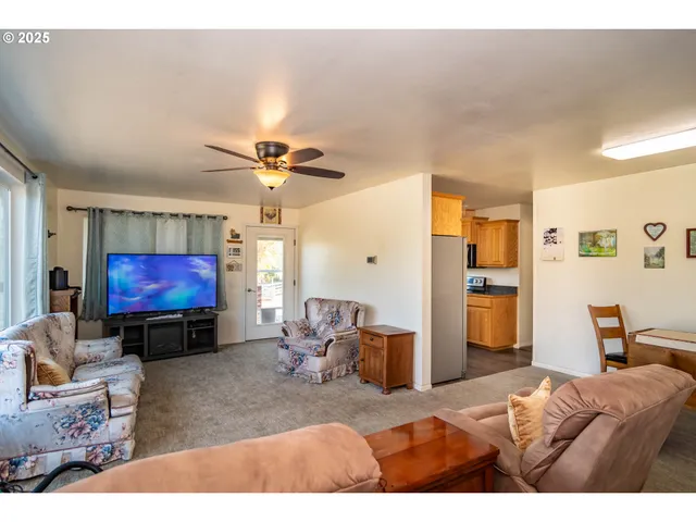 a living room with furniture and window
