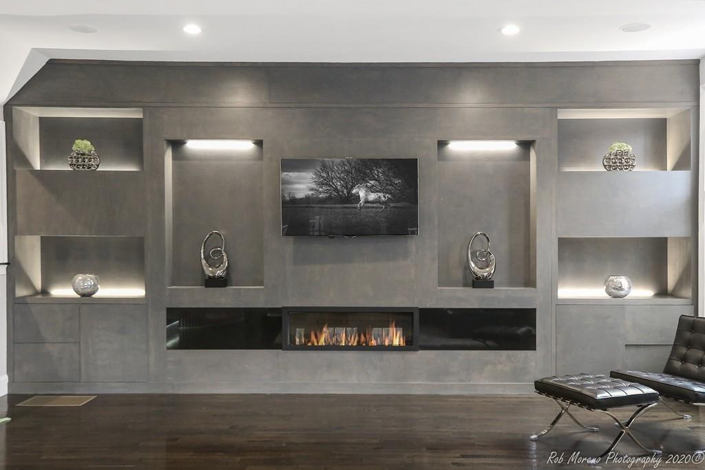 13 Pollock Drive Middleton, MA 01949 - Photo 12 of 42 a living room with furniture and a fireplace