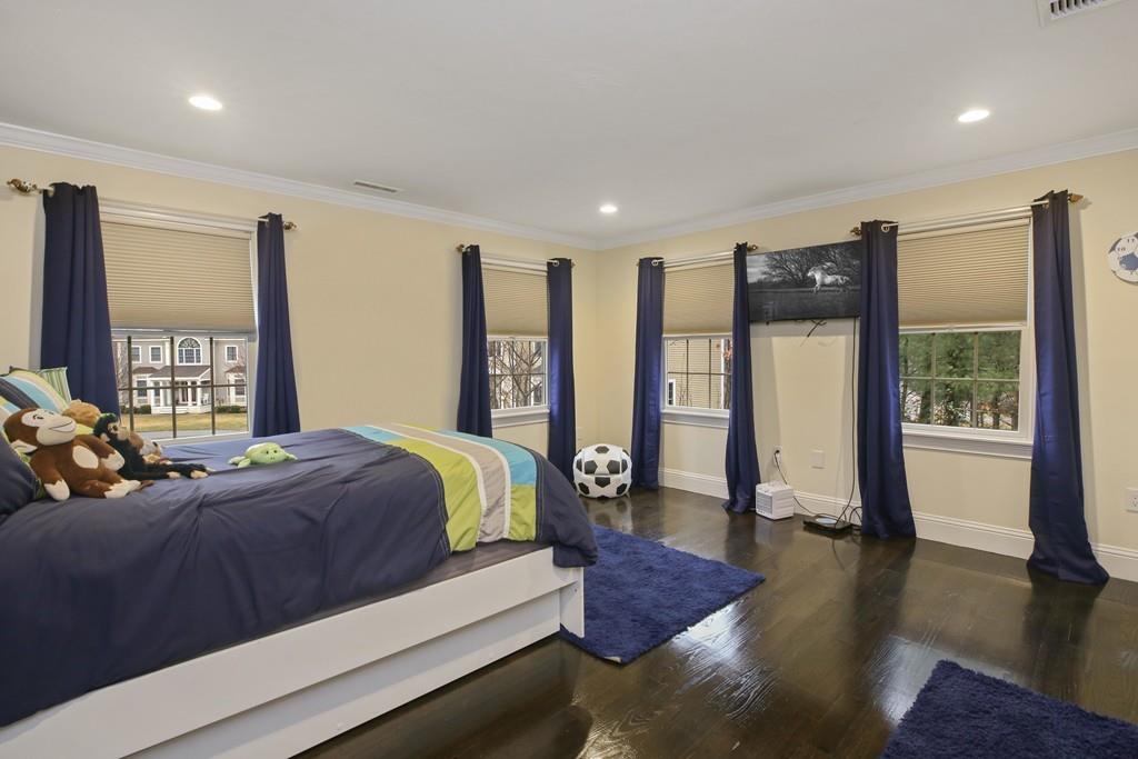 13 Pollock Drive Middleton, MA 01949 - Photo 15 of 42 a bed room with a bed and a large window