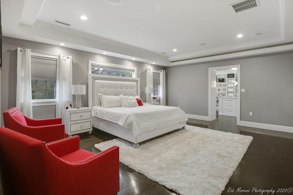 13 Pollock Drive Middleton, MA 01949 - Photo 20 of 42 a bedroom with bed and glass door