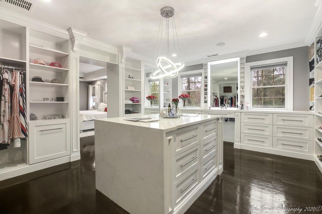 13 Pollock Drive Middleton, MA 01949 - Photo 22 of 42 a kitchen with stainless steel appliances kitchen island granite countertop a sink and cabinets