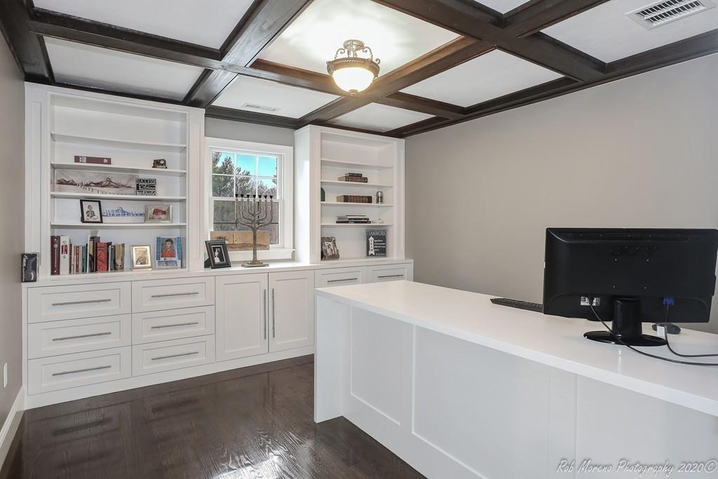 13 Pollock Drive Middleton, MA 01949 - Photo 26 of 42 a kitchen with a stove cabinets and a window