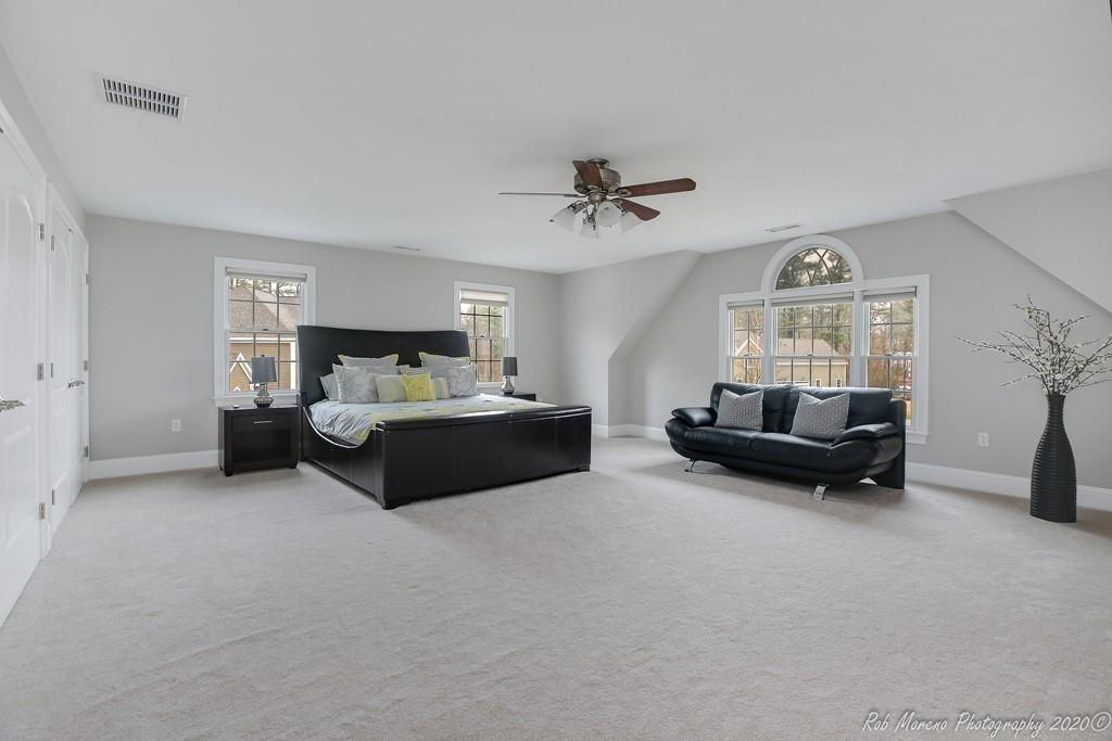 13 Pollock Drive Middleton, MA 01949 - Photo 28 of 42 a living room with furniture and a window