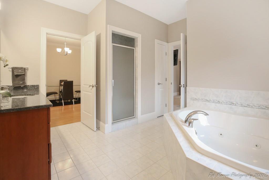 13 Pollock Drive Middleton, MA 01949 - Photo 34 of 42 a bathroom with a bathtub and a shower