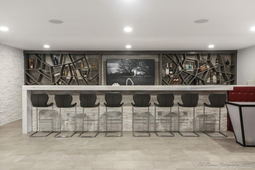 13 Pollock Drive Middleton, MA 01949 - Photo 38 of 42 a view of a chair and table in a room