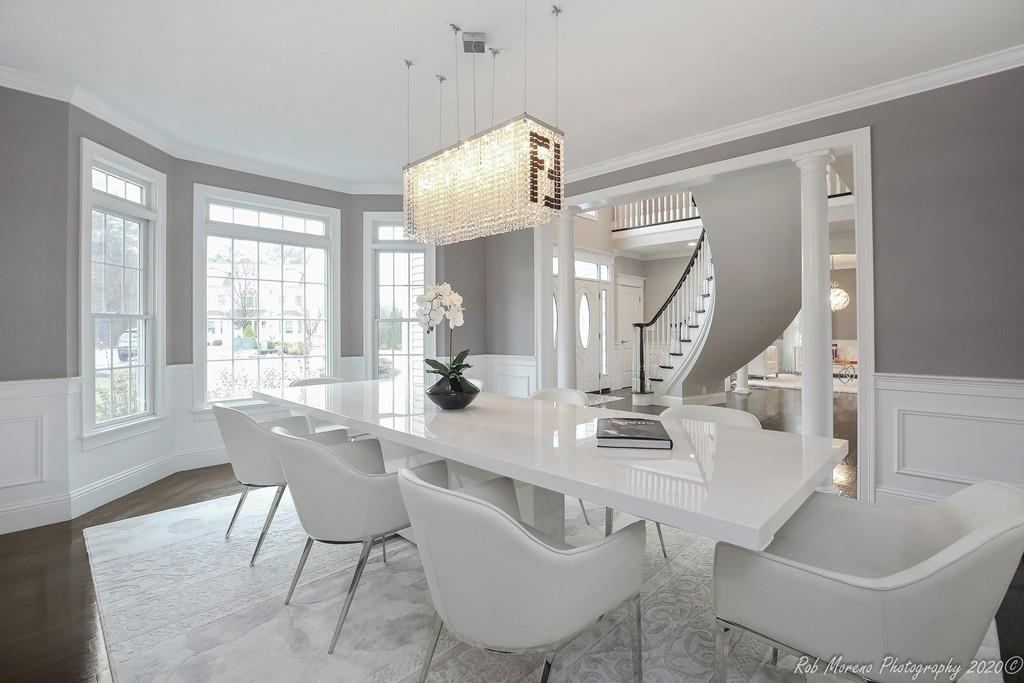 13 Pollock Drive Middleton, MA 01949 - Photo 4 of 42 a view of a dining room with furniture and wooden floor