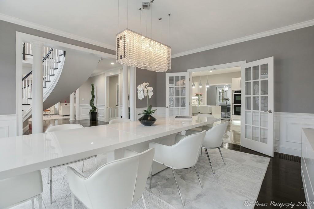 13 Pollock Drive Middleton, MA 01949 - Photo 5 of 42 a large white kitchen with a table and chairs