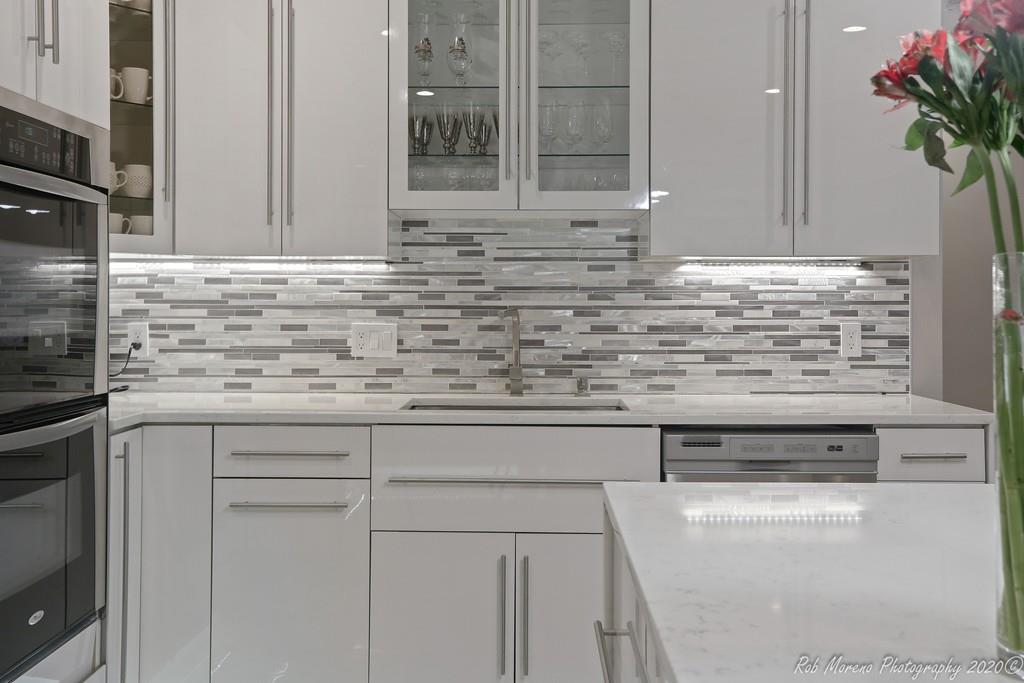 13 Pollock Drive Middleton, MA 01949 - Photo 7 of 42 a bathroom with a granite countertop sink and a mirror
