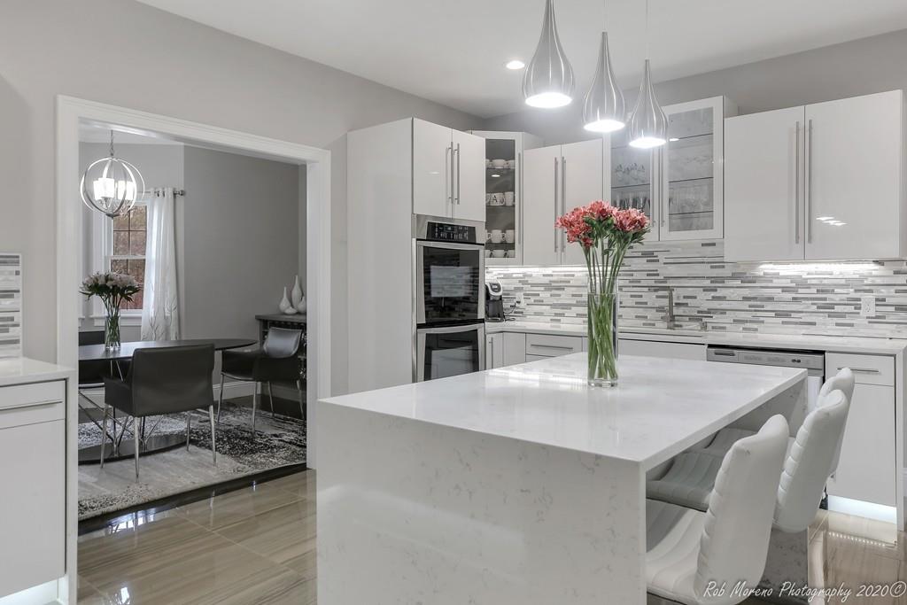 13 Pollock Drive Middleton, MA 01949 - Photo 9 of 42 a view of kitchen with cabinets and outdoor space