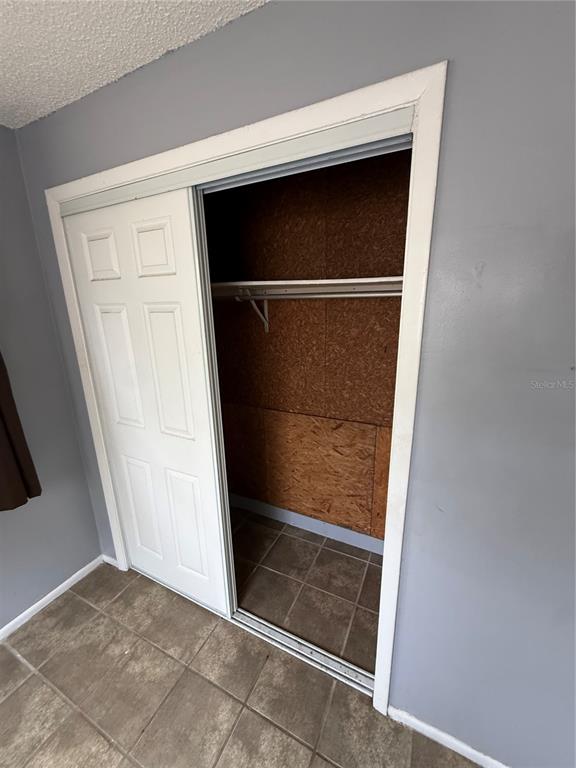 9275 Chase Street Spring Hill, FL 34606 - Photo 25 of 29 a view of an empty room