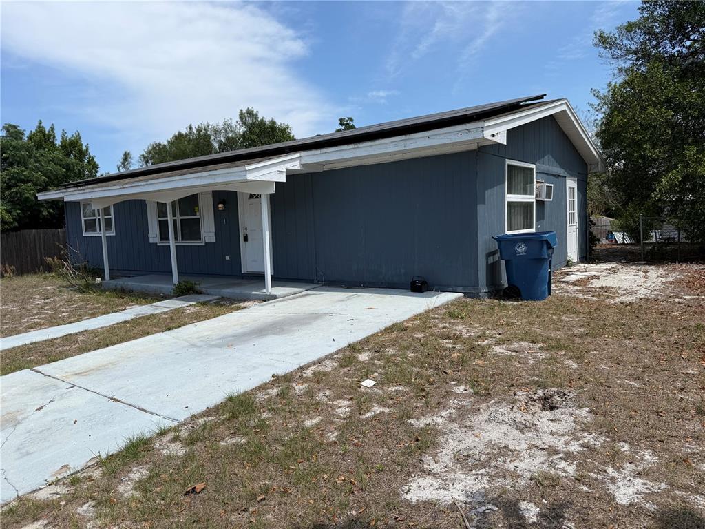 9275 Chase Street Spring Hill, FL 34606 - Photo 5 of 29 a house with a outdoor space