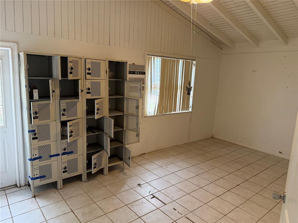 9275 Chase Street Spring Hill, FL 34606 - Photo 6 of 29 a view of empty room with windows