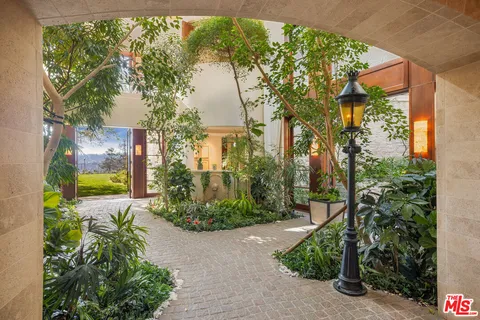 a view of a back yard of the house