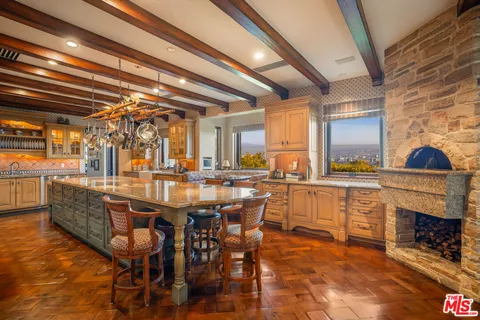 a view of a kitchen and dining room