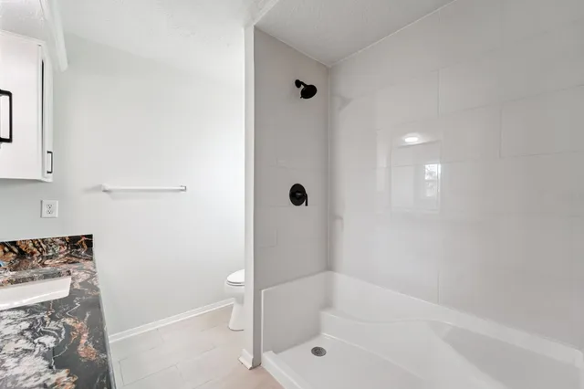 a bathroom with a bathtub