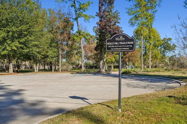 a view of a park with swings and slides
