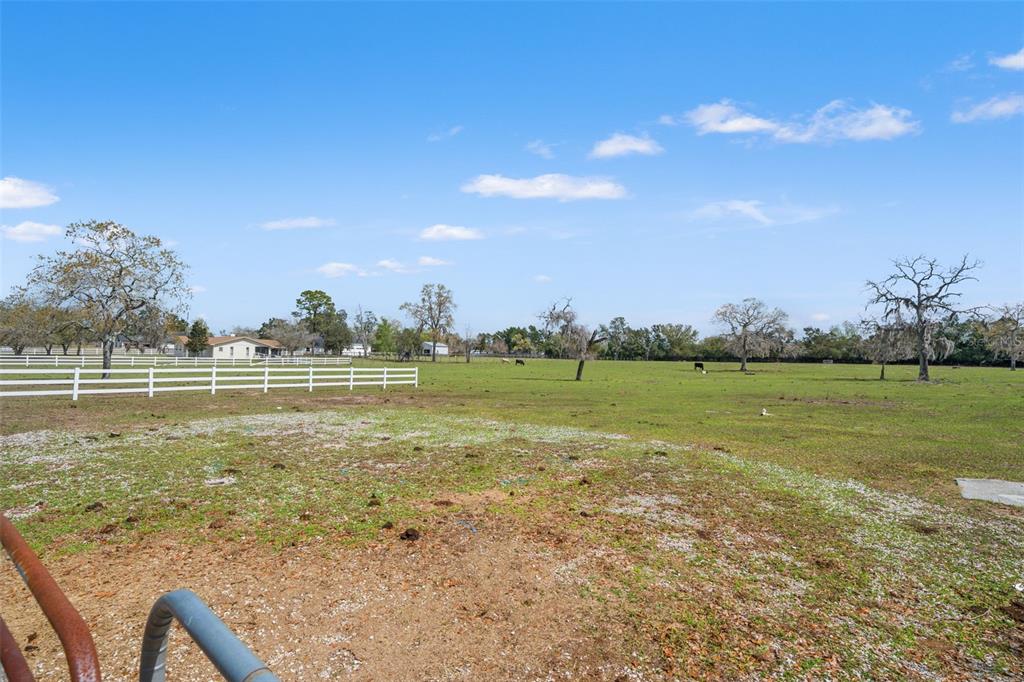 0 Gloucester Road Brooksville, FL 34604 - Photo 26 of 49 a view of a lake with houses in back