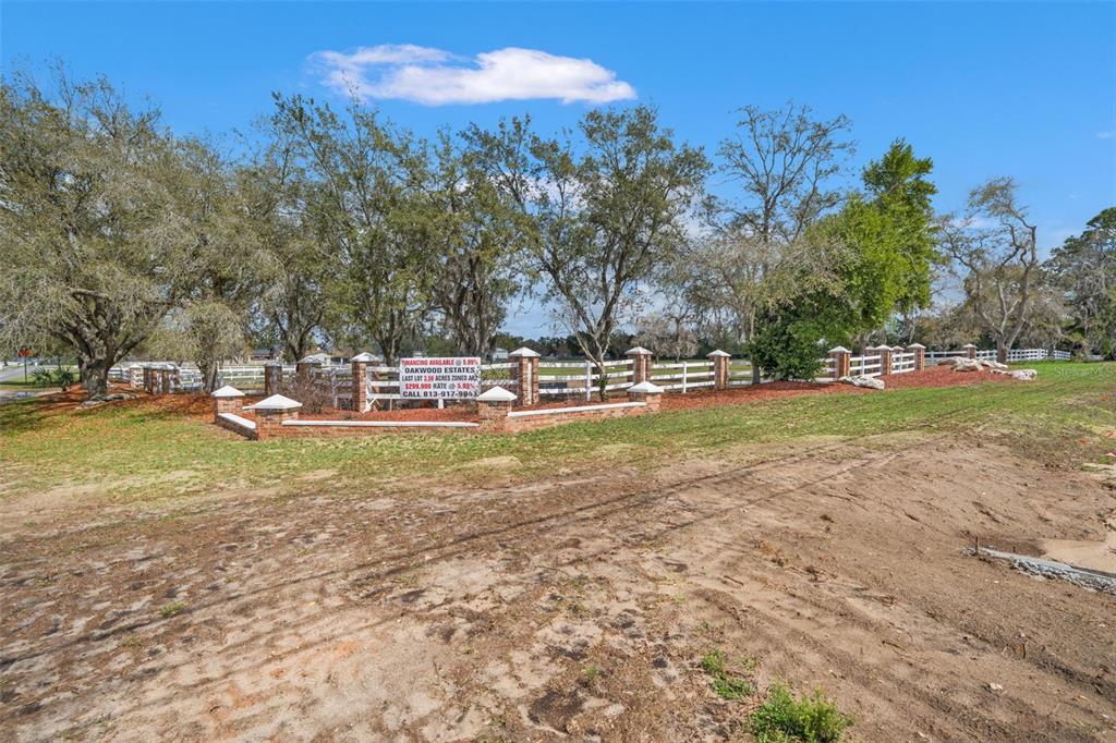 0 Gloucester Road Brooksville, FL 34604 - Photo 46 of 49 a view of yard with swimming pool and trees