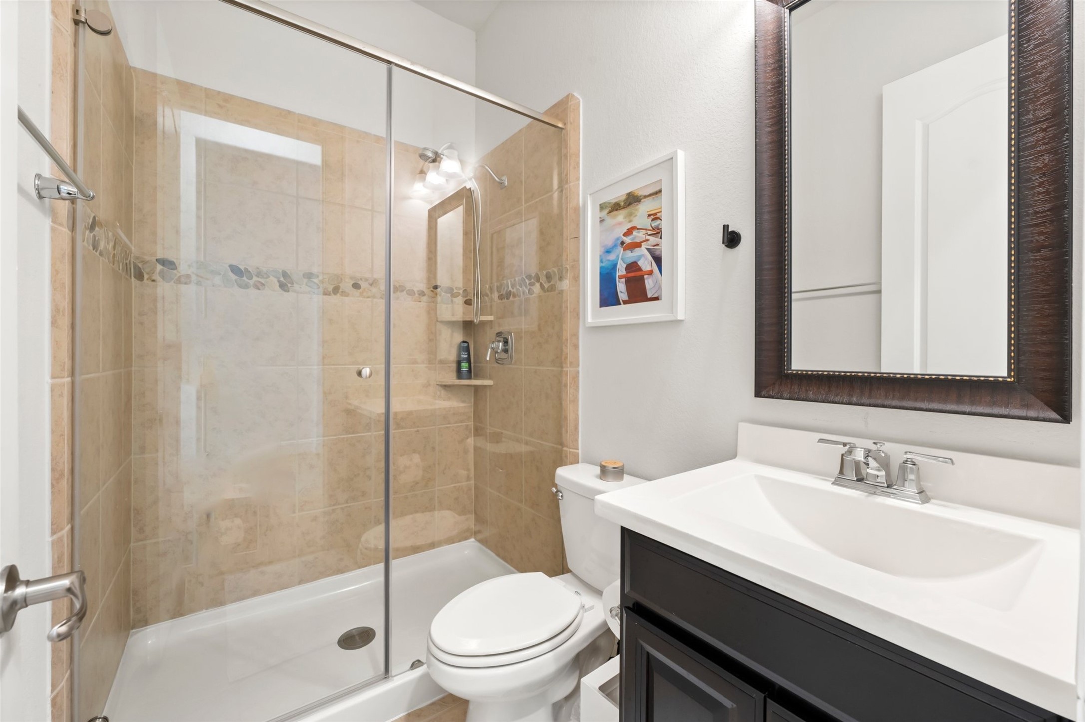 1053 Bat Hawk Court Conroe, TX 77385 - Photo 35 of 50 a bathroom with a sink toilet and shower