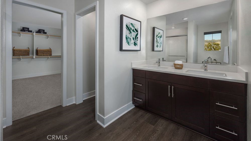 9552 Glenmore Frst Drive Riverside, CA 92508 - Photo 8 of 17 a kitchen with a sink and a mirror